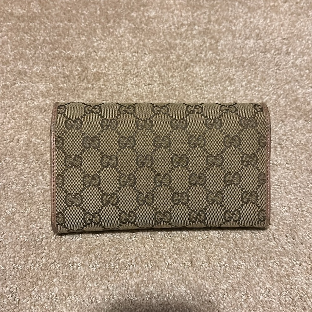 Gucci wallet

Original GG Canvas Lovely Heart Continental Wallet - Picture 4 of 7